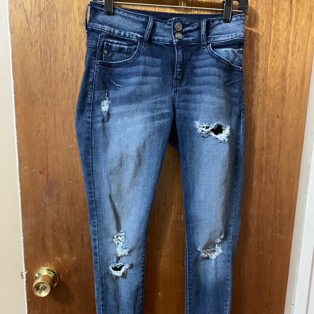 Ripped blue jeans